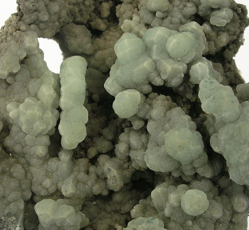 Gibbsite — Bianco, grigio, sistema monoclino, durezza 2.5-3 | minerale